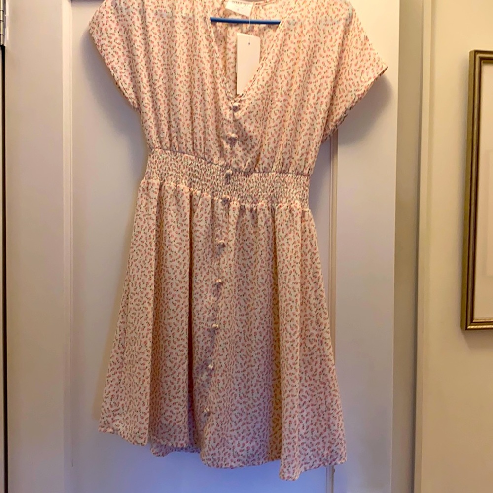 Pretty flowery dress. Brand new. Junior sizing